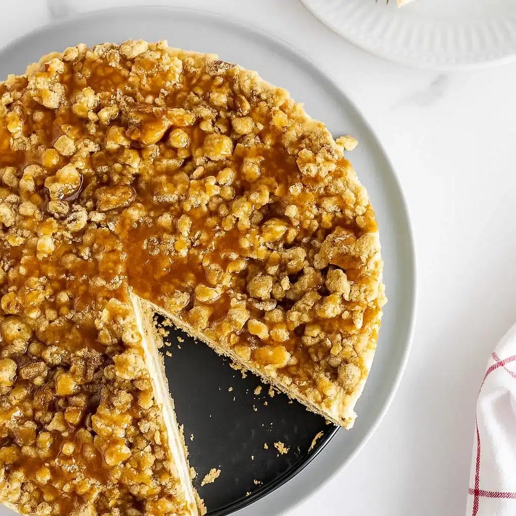 butter-brickle-frozen-delight-2 Butter Brickle Frozen Delight is a luscious layered dessert that combines a buttery graham cracker crust with smooth vanilla ice cream and rich butterscotch topping.
